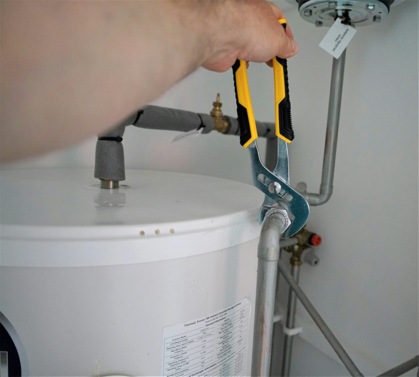 MWWS technician servicing a water heater